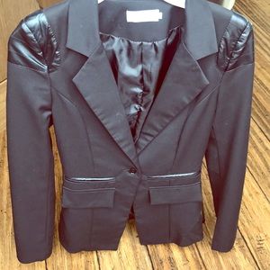 Women's blazer with leather detailing